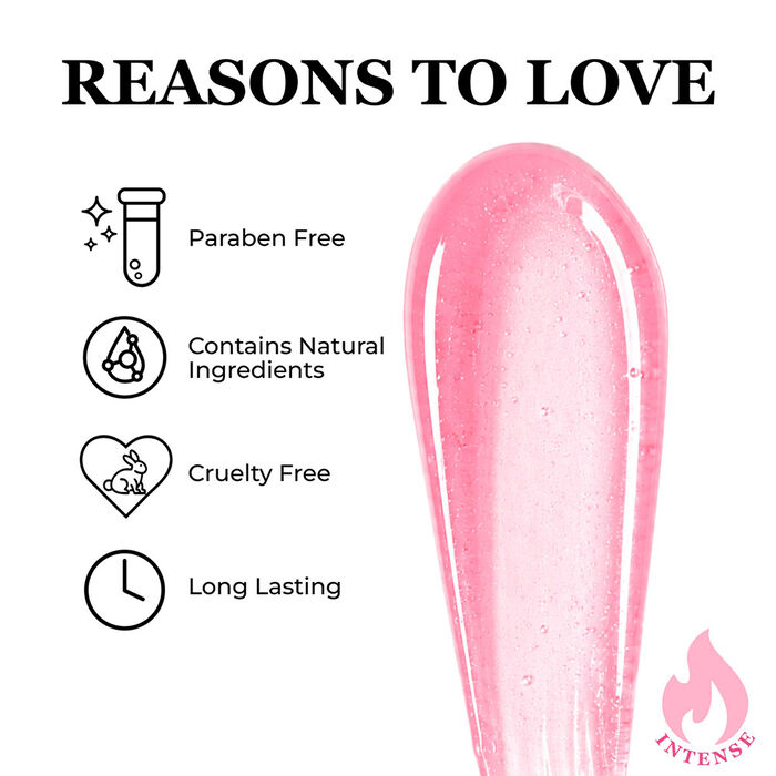 Applying Hot Kiss Lip Plumper for instant shine, hydration, and fuller-looking lips